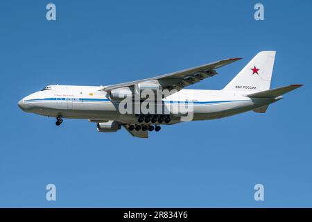 SAINT PETERSBURG, RUSSIA - MAY 30, 2023: Heavy transport aircraft Ruslan An-124-100 (RF-82011) of the Russian Air Force in the blue cloudless sky Stock Photo