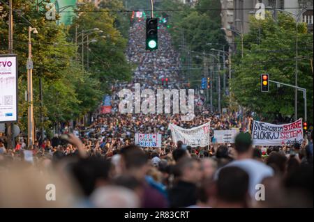 BELGRADE, SERBIA - JUNE 17, 2023.: Protest, uprising, march or strike in city streets. Crowd of people marching. Activism for equal human rights and a Stock Photo