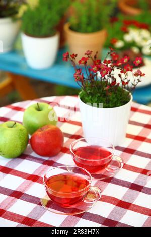Two cups of tea served in the garden Stock Photo