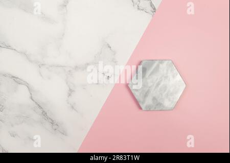 Top view of marble tray on pink and white marble background. Creative product presentation flat lay. Copy space. Stock Photo