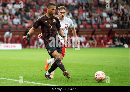 WARSAW, POLAND - JUNE 16, 2023: Friendly football match  Poland vs Germany 1:0. In action Thilo Kehrer (L) Michal Skoras (R). Stock Photo