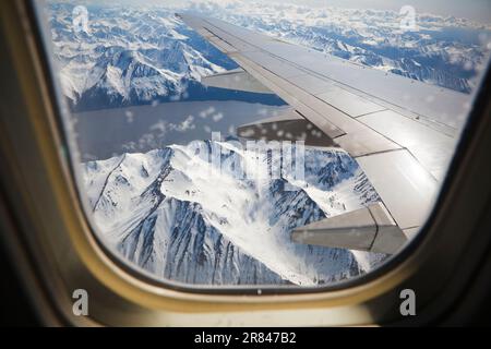 View of Turnagain Arm, dividing the Kenai and Chugach Mountains, from an airplane bound for Anchorage, Alaska. Stock Photo