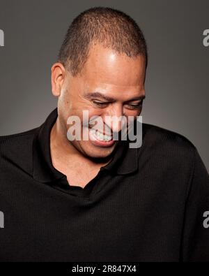 Studio portrait of 47 year old African American man laughing. Stock Photo