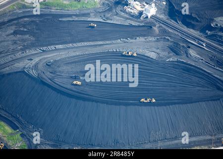 Aerial view of coal stockpile at power plant Stock Photo