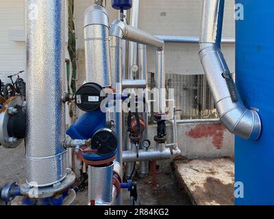 Refinery plant equipment for pipe line oil and gas valves at gas plant pressure safety valve selective. Stock Photo