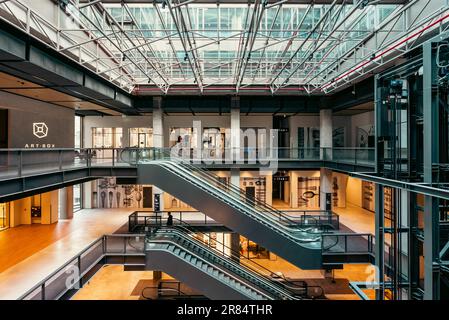 Warsaw, Poland-05 July, 2022:Interior of Norblin Factory, Fabryka Norblina - post-industrial architecture with offices. shops, restaurants Stock Photo