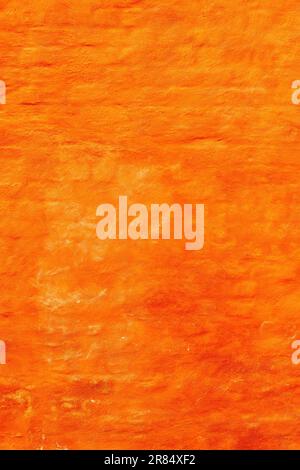 Orange brick wall facade as background. Old building exterior wall surface from Halmstad in Sweden. Stock Photo