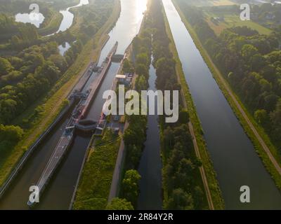 DUFFEL, LIER, BELGIUM, May 31, 2023, Aerial view of the River lock between Nete Channel and Nete River, showing the lock or sluis from above. High quality photo Stock Photo