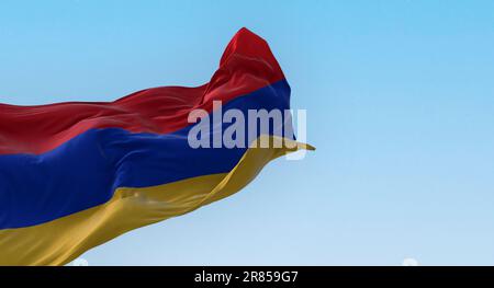 The national flag of Armenia waving in the wind on a clear day. Three horizontal bands in red, blue and apricot. 3d illustration render. Rippled texti Stock Photo