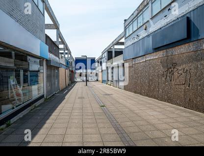 Run down and boarded up shopping precinct prior to being rejuvenated in an English town centre. Stock Photo