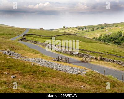 A cattle grid on the road above Langthwaite in Arkengarthdale, Yorkshire Dales, UK. Stock Photo