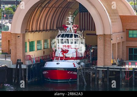 San Pedro, CA, USA – June 2, 2023: Docked in a arched building is Los Angeles City Fire Department Fireboat number 2 at the Port of Los Angeles in San Stock Photo