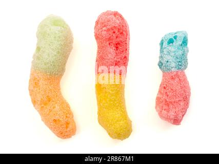 Freeze Dried Bicolored Candy Sour Worms Isolated on a White Background Stock Photo
