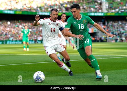 Republic of Ireland's Jamie McGrath (right) and Gibraltar's Roy Chipolina battle for the ball during the UEFA Euro 2024 Qualifying Group B match at the Aviva Stadium, Dublin. Picture date: Monday June 19, 2023. Stock Photo