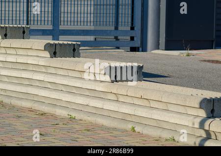 dry stone walls, construction detail of prefabricated walls in gravity concrete blocks, retaining wall in concrete blocks. Stock Photo