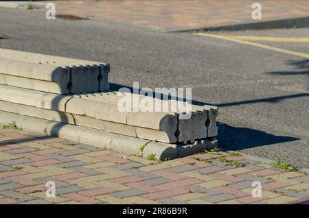 dry stone walls, construction detail of prefabricated walls in gravity concrete blocks, retaining wall in concrete blocks. Stock Photo