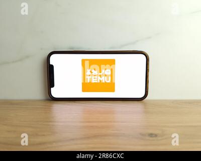 Konskie, Poland - June 17, 2023: Temu online marketplace logo displayed on mobile phone screen Stock Photo