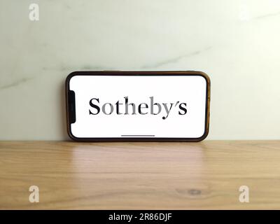 Konskie, Poland - June 17, 2023: Sothebys auction house logo displayed on mobile phone screen Stock Photo