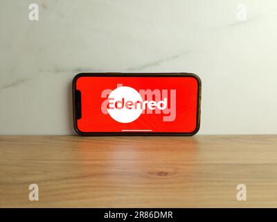 Konskie, Poland - June 17, 2023: Edenred company logo displayed on mobile phone screen Stock Photo