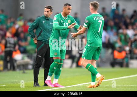 Republic of Ireland's Evan Ferguson (right) is subsituted off for team-mate Adam Idah during the UEFA Euro 2024 Qualifying Group B match at the Aviva Stadium, Dublin. Picture date: Monday June 19, 2023. Stock Photo