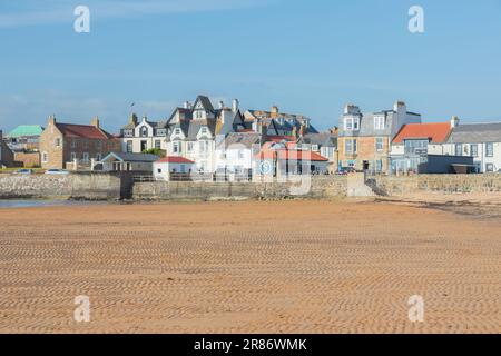 Elie, UK - June 9 2023: Sandy beach and shoreline at low tide in the seaside coastal village of Elie, East Neuk, Fife, Scotland. Stock Photo