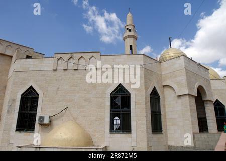 A view of a destroyed mosque after Israeli helicopters bombed a site next to it during a raid on the Jenin camp in the northern occupied West Bank. Israeli army forces raided the Jenin refugee camp near the city of Jenin with helicopters and dozens of armored military vehicles. The raid lasted ten hours, killing five Palestinians, including a child, and wounding dozens. The Palestinian resistance fighters installed a homemade device that exploded under an Israeli military vehicle, which destroyed it, injuring seven Israeli soldiers who were inside. The Israeli military correspondent 'Dfoury' s Stock Photo