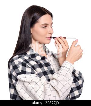 Woman using cigarette holder for smoking isolated on white Stock Photo