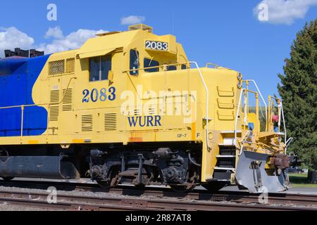 Elgin, OR, USA - May 24, 2023; Blue and yellow locomotive cab of Wallowa Union Railroad locomotive in Elgin Oregon Stock Photo