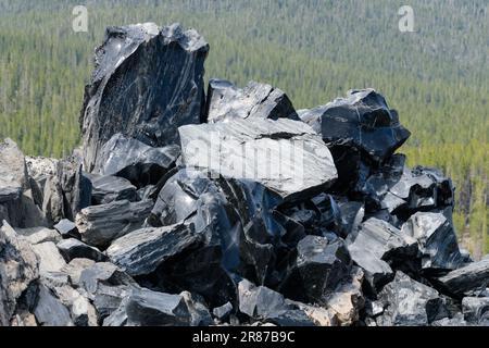 Natural obsidian volcanic glass at Newberry Volcano in Oregon Stock Photo