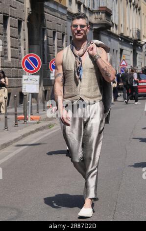 Milan Men's Fashion Week: Giorgio Armani mixed elegance with a touch of  whimsy through colour blocking and surprising prints for spring/summer 2023  in shades of blue