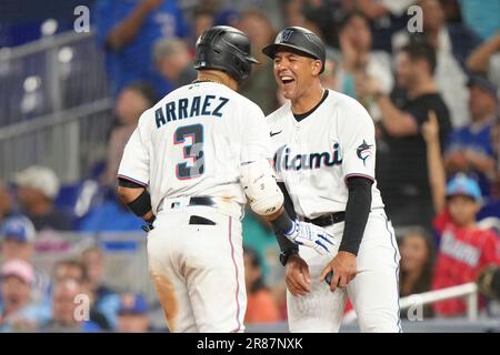 Miami Marlins first base coach Jon Jay (11) talks with Luis Arraez