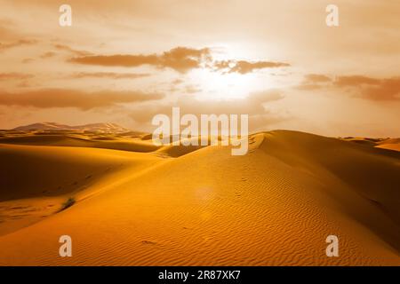 Majestic beautiful scene of Merzouga dunes of Sahara desert Morocco. Stock Photo