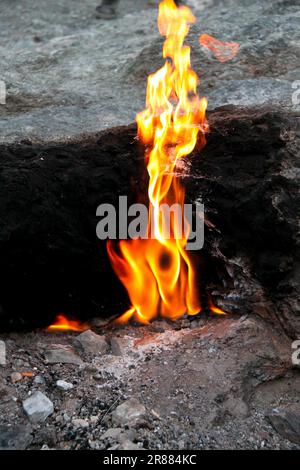 Incessantly, the natural gas flames in Chimera flicker from the ground Turkey Stock Photo