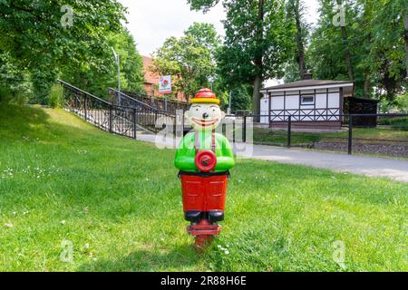 Colorful and funny fire hydrant, Poland. Stock Photo