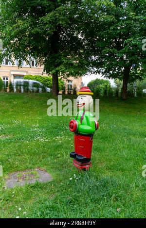 Colorful and funny fire hydrant, Poland. Stock Photo