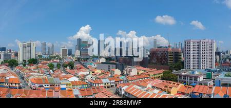 Singapore city panorama with low rise shophouses of Little India conservation neighborhood in foreground and CBD in the south, in background Stock Photo