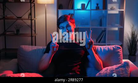 Peace gesture funny man meme expression happy Stock Photo