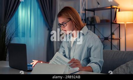 Late work busy woman online research concentrated Stock Photo