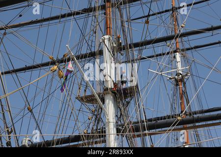 People climbing rigging of Cutty Sark Greenwich London June 2023 Stock Photo