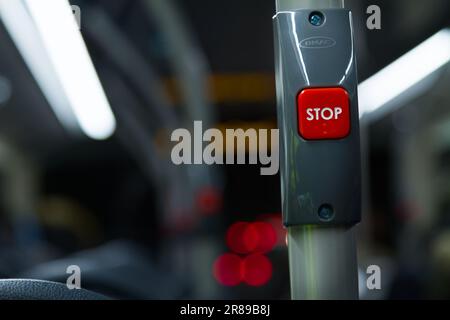 Red Stop Request Button On A Bus At Night, England UK Stock Photo