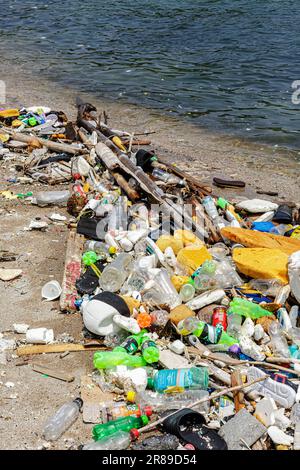 Manila Bay, Philippines, June 5, 2023 Plastic bottles of trash litter the beaches of Manila Bay in the Philippines Stock Photo