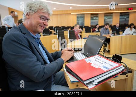 Wiesbaden, Germany. 20th June, 2023. Torsten Felstehausen (Die Linke), a member of the Hesse state parliament, sits in the plenary hall during what is expected to be the last meeting of the Hesse state parliament's committee of inquiry into the murder of Kassel district president Lübcke. The Lübcke investigation committee of the Hessian state parliament has met for three years. Its first meeting was on June 30, 2020. Credit: Sebastian Christoph Gollnow/dpa/Alamy Live News Stock Photo