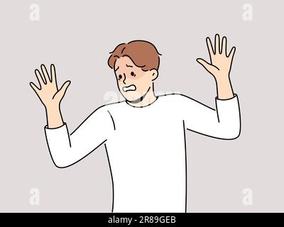 Frightened man raises hands in surrender and demonstrates obedience and refusal to resist. Frightened guy experiencing panic attack due to phobia associated with psychological trauma Stock Vector