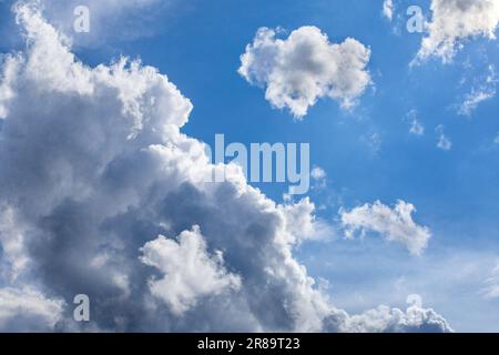 Cumulus storm clouds brewing on humid summer day - France. Stock Photo
