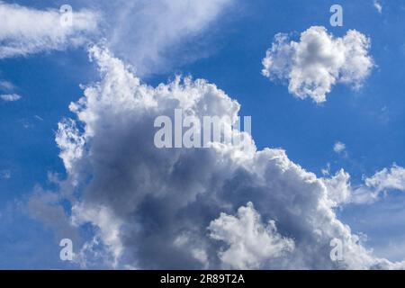 Cumulus storm clouds brewing on humid summer day - France. Stock Photo