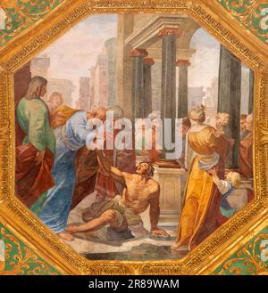 GENOVA, ITALY - MARCH 6, 2023: The fresco Saints Peter and John Healing the Lame Man in the church Basilica della Santissima Annunziata del Vastato Stock Photo