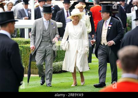King Charles III, left, and Queen Camilla arrives to visit the