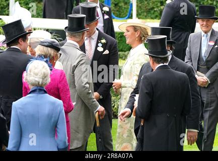 Zara Tindall (centre right) and Mike Tindall speaks with King Charles III (left) during day one of Royal Ascot at Ascot Racecourse, Berkshire. Picture date: Tuesday June 20, 2023. Stock Photo