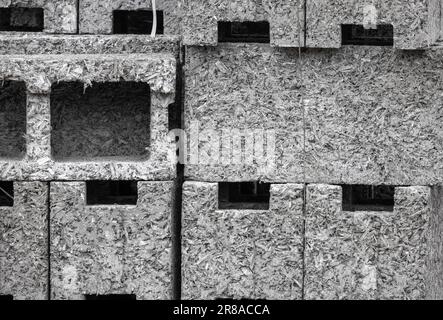 Stacked arbolite blocks. This construction material is lightweight concrete based on cement binder, organic aggregates and chemical additives. Also kn Stock Photo