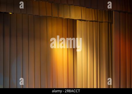 Scenic curtains with colorful spot lights illumination, background photo texture Stock Photo